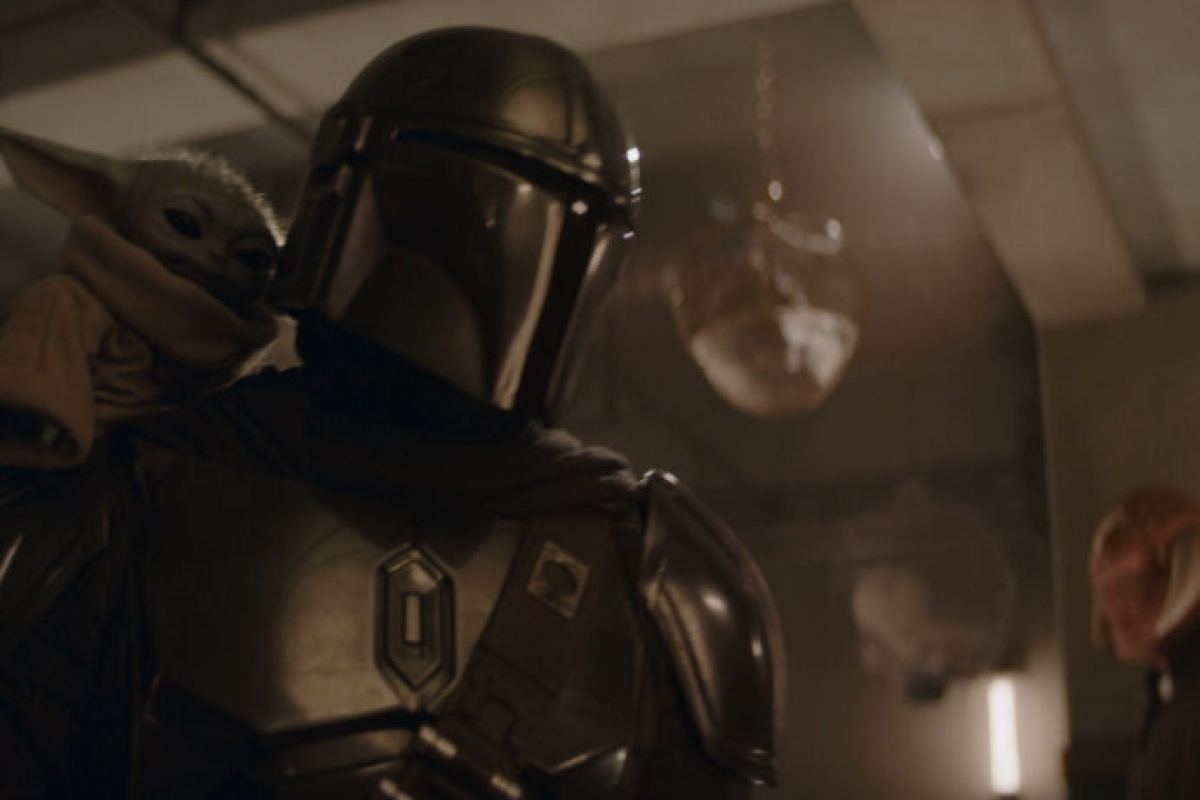 Foto Mandalorian a Grogu